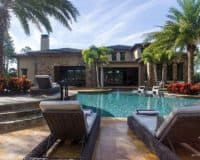 Custom Home Builders In Florida | Villa Minas Rear Elevation Pool | Hampton Bay Homes